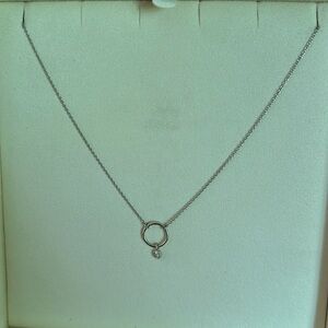 14K white gold dainty necklace with small hoop and diamond pendant. 17” chain.